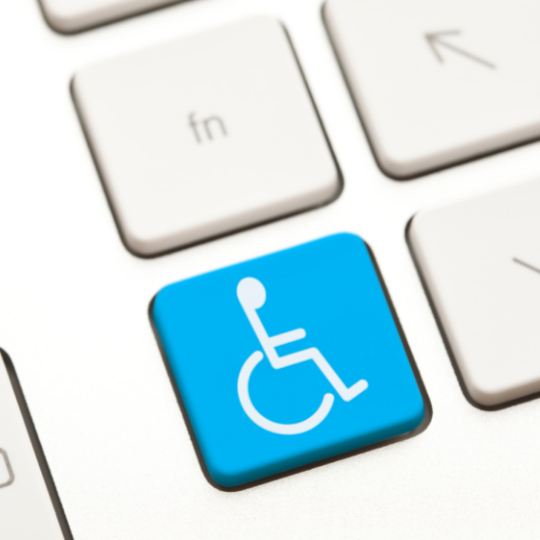 a keyboard key with a wheelchair