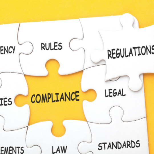 a puzzle piece with the word "compliance"
